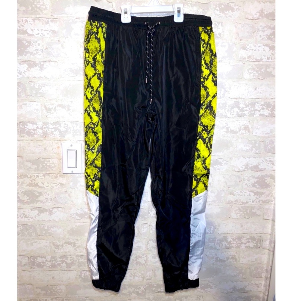 Neon snakeprint windbreaker pants